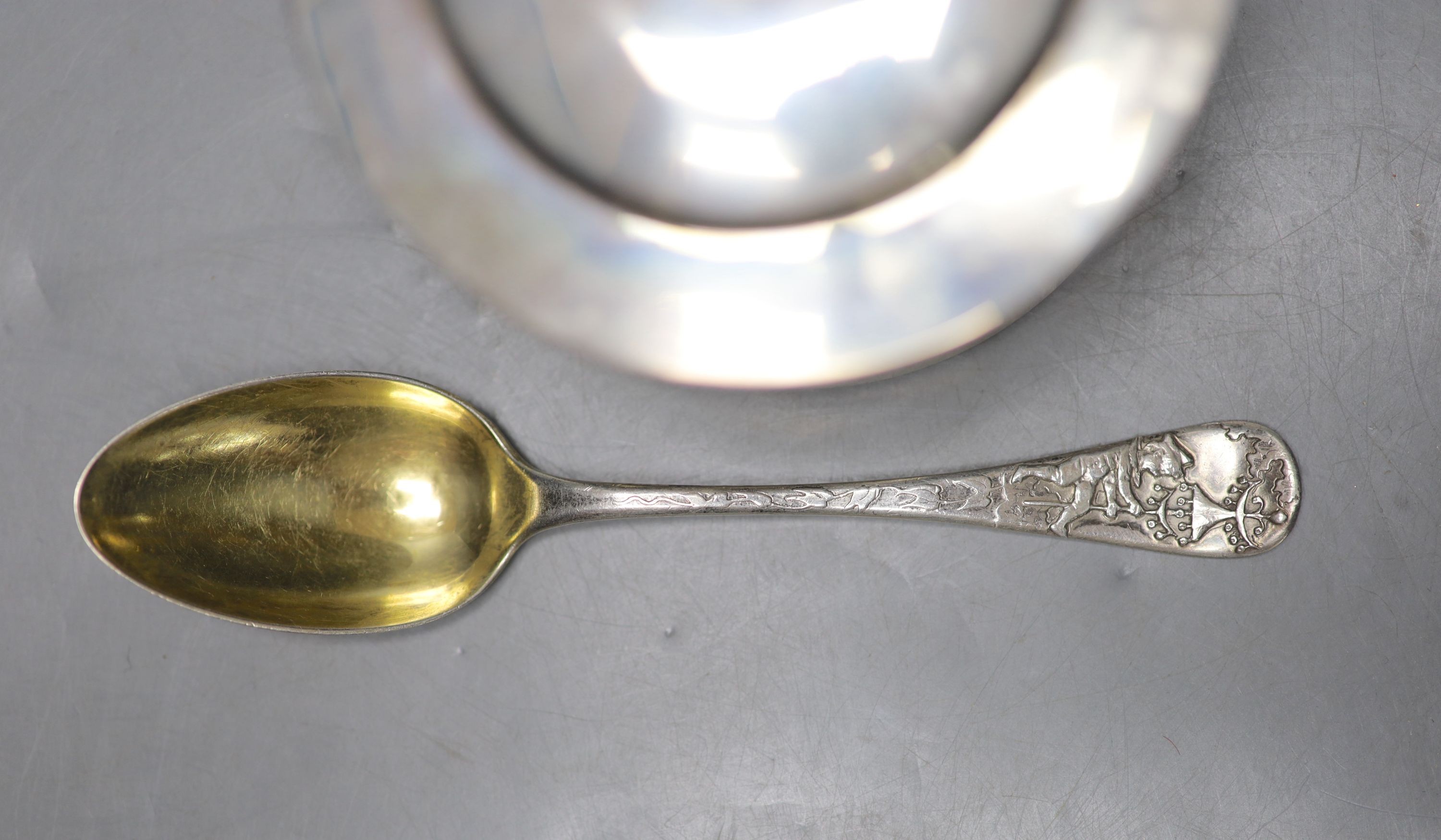 A late 19th/early 20th century Tiffany & Co sterling brandy warmer? and cover, length 16.7cm, and a Tiffany & Co sterling spoon, gross weight 8.5oz.